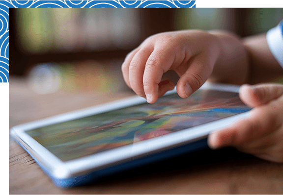 stjohns-student-interacting-with-tablet.png