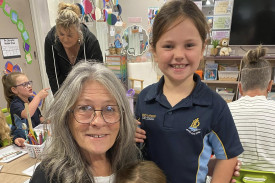A photos of a St John’s Lutheran Primary School Portland student with her grandparents at Easter 2025 celebrations.