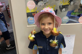 A photos of a St John’s Lutheran Primary School Portland student with her grandparents at Easter 2025 celebrations.