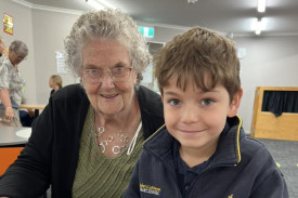 A photos of a St John’s Lutheran Primary School Portland student with her grandparents at Easter 2025 celebrations.