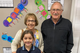 A photos of a St John’s Lutheran Primary School Portland student with her grandparents at Easter 2025 celebrations.